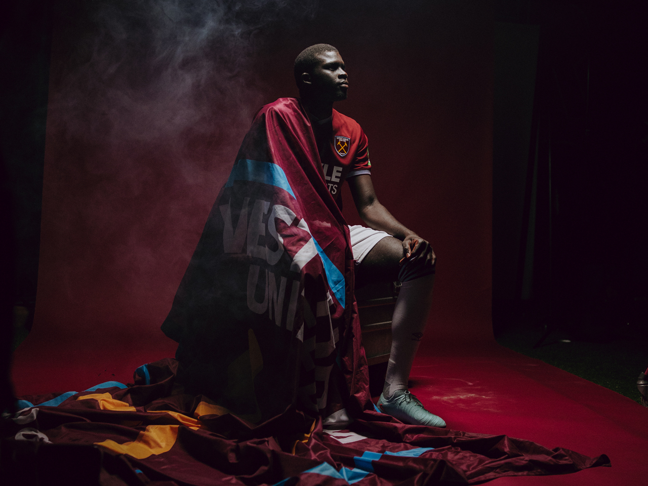 El Hadji Malick Diouf in West Ham flag