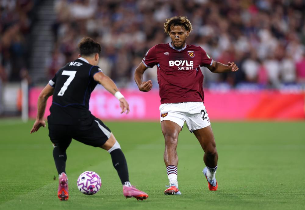Jean-Clair Todibo takes on Pedro Neto at London Stadium