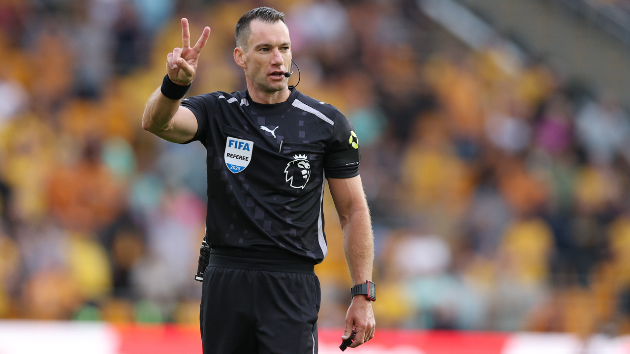 Referee Jarred Gillett