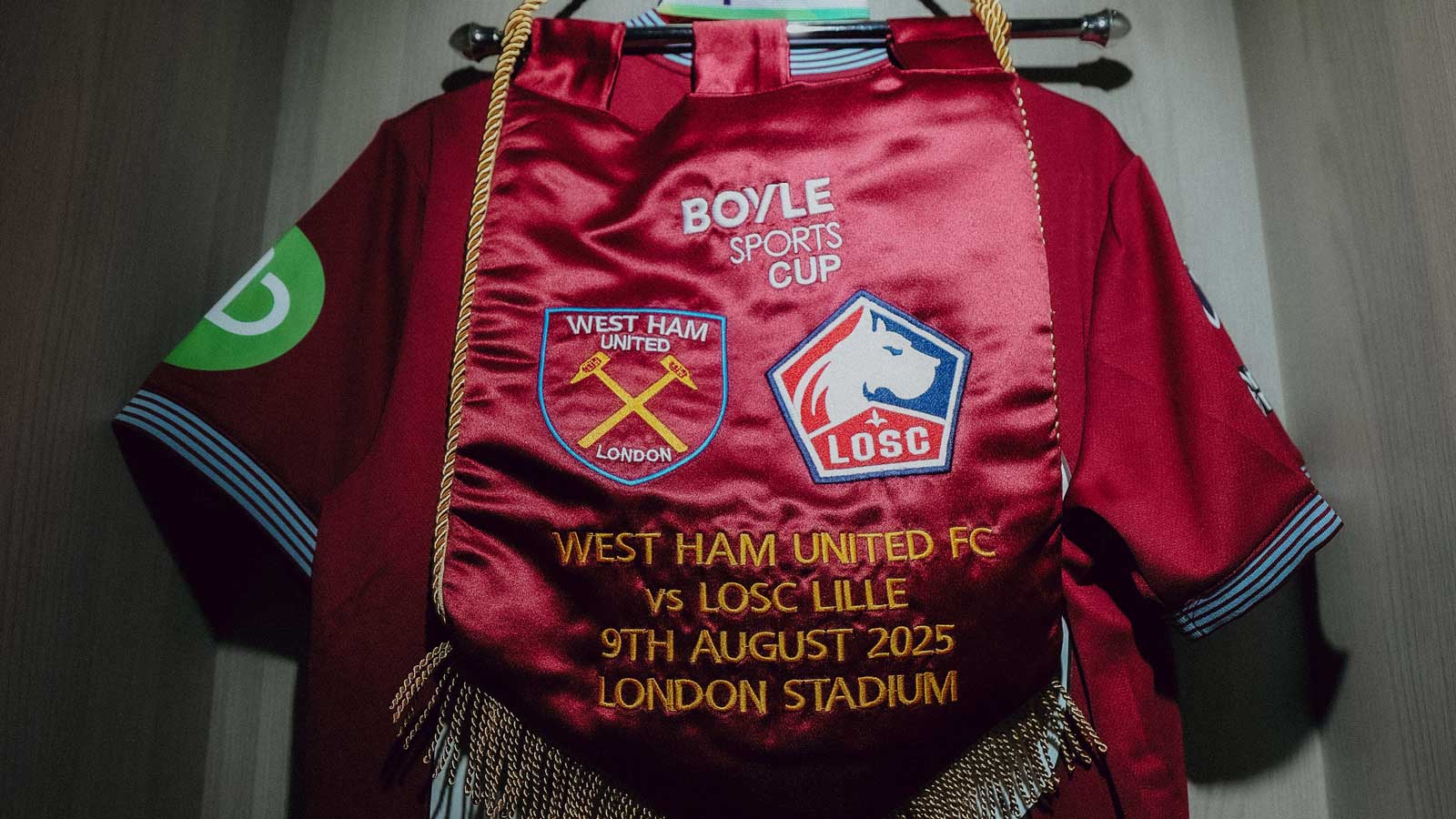 A pennant hangs in the Hammers dressing room ahead of the match against Lille