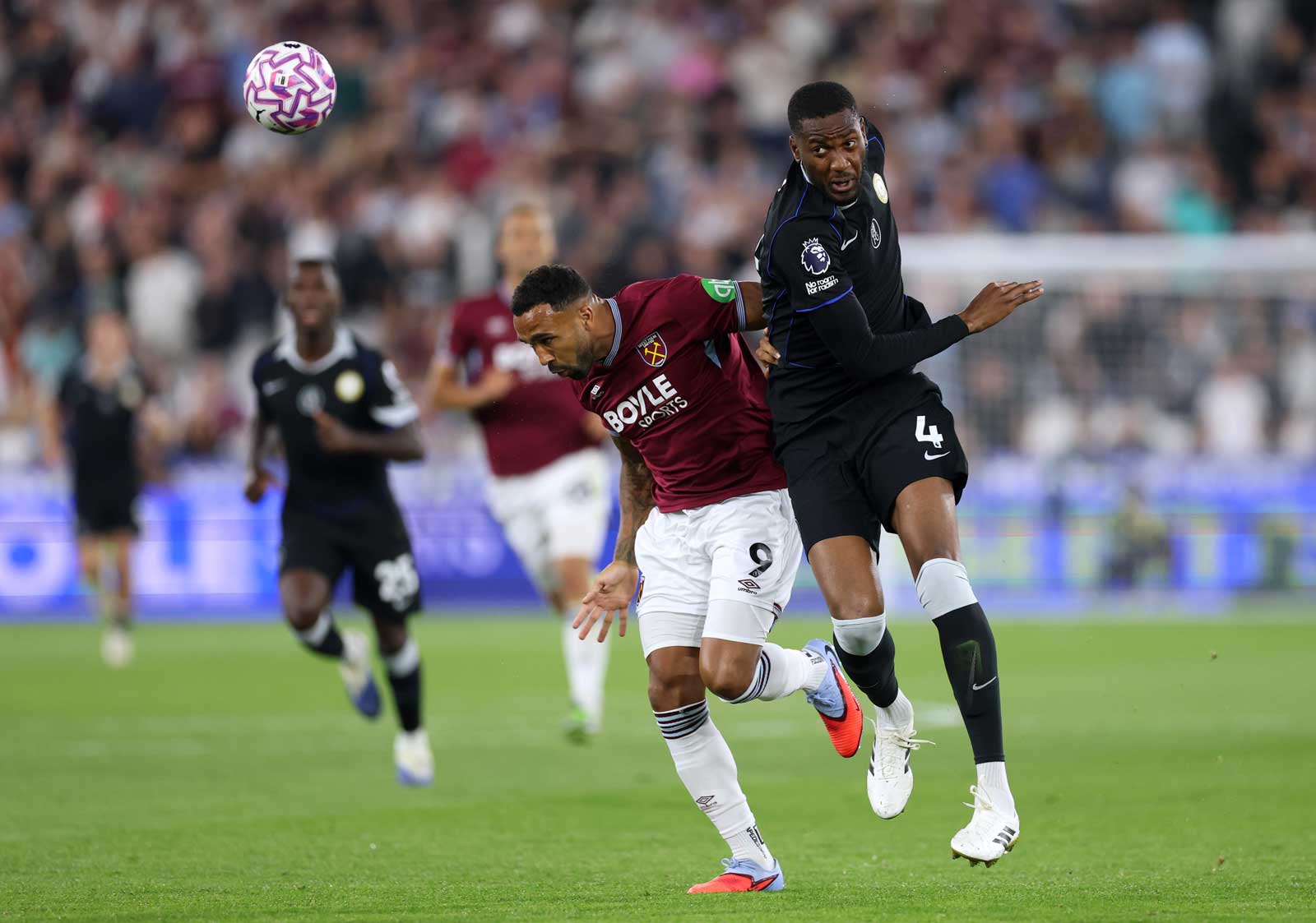 Callum Wilson battles with Tosin