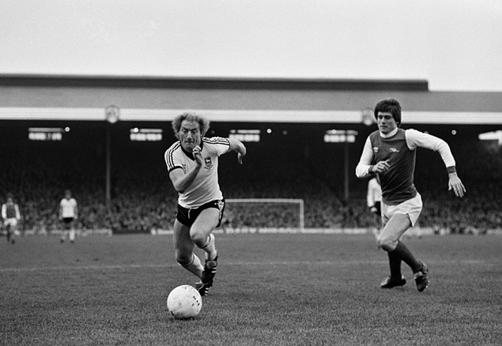 Steve Walford keeps tabs on Ipswich Town's Alan Brazil