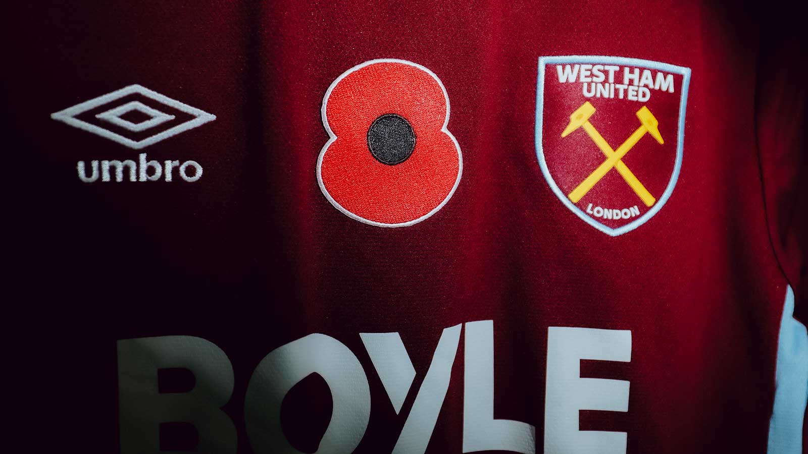 A poppy on front of a West Ham United shirt