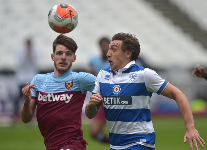 Declan Rice in action against Queens Park Rangers' Jordan Hugill at London Stadium