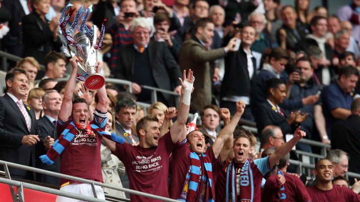 Noble and Collison celebrate winning promotion in 2012