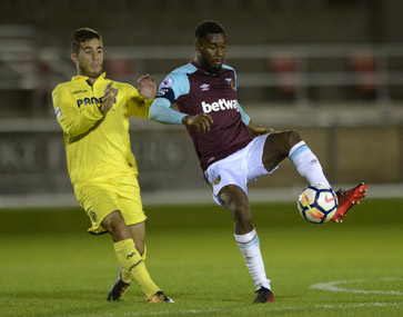 U23 captain Moses Makasi battles for possession