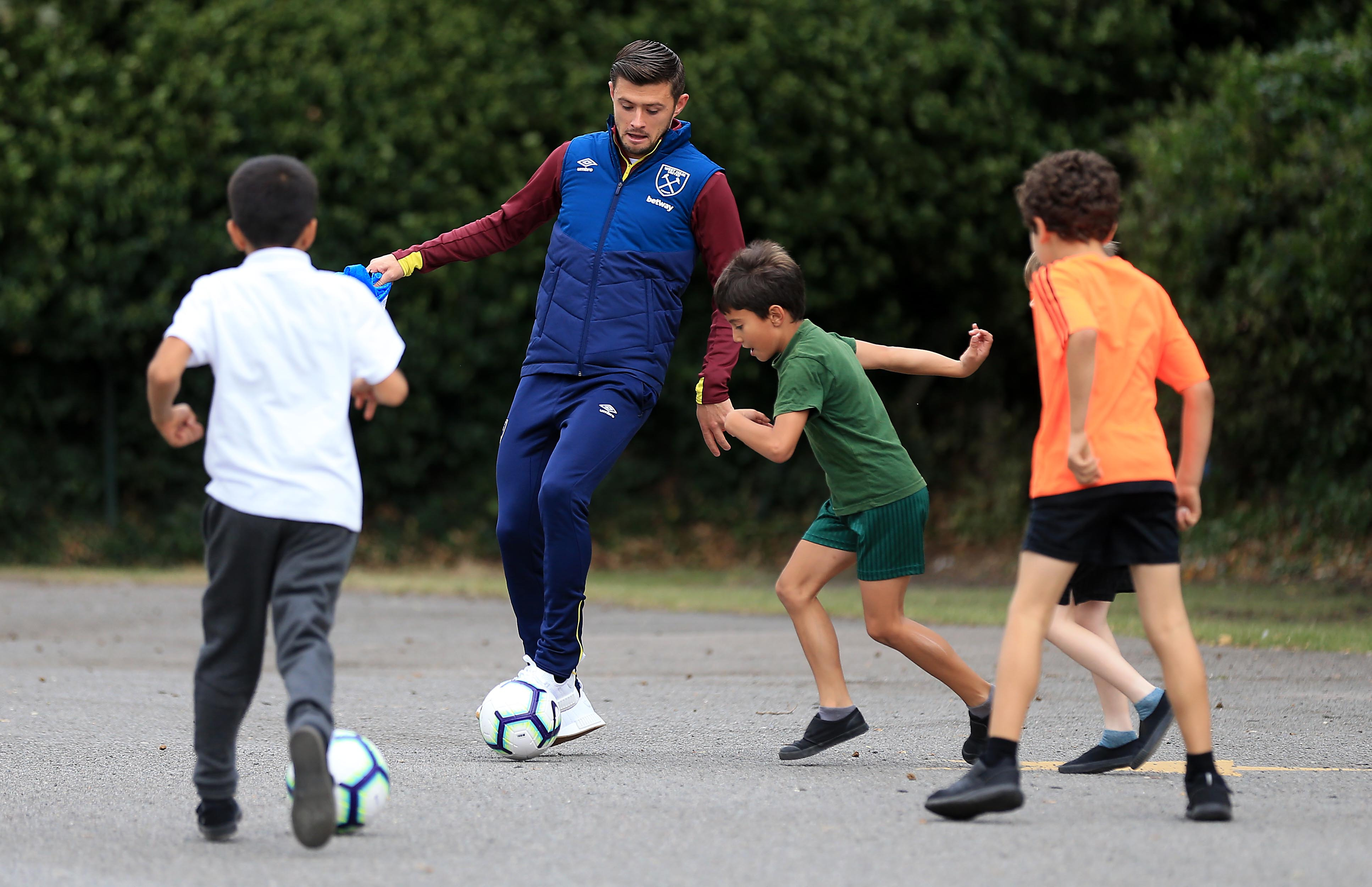 Aaron Cresswell surprises pupils