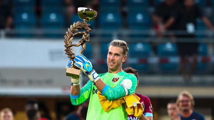 Adrian lifts the Betway Cup following victory over Mainz in Austria