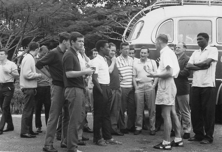 The Irons prepare to board a bus during their three-week summer tour
