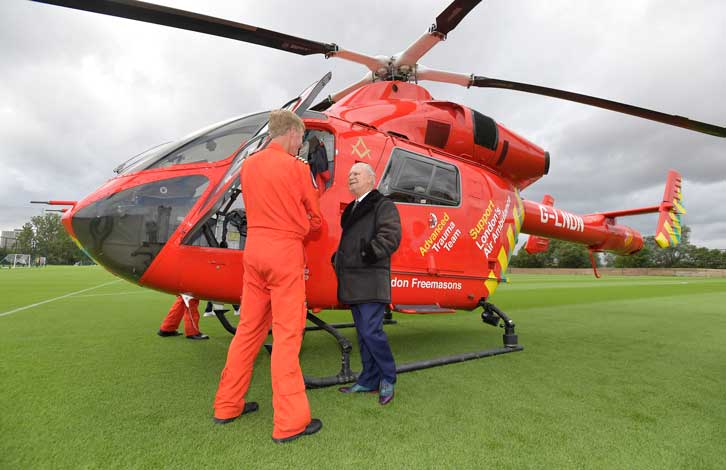 David Gold chats with the pilots of the London Air Ambulance
