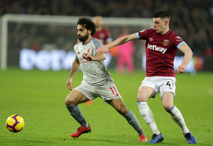 Declan Rice keeps tabs on Mohamed Salah