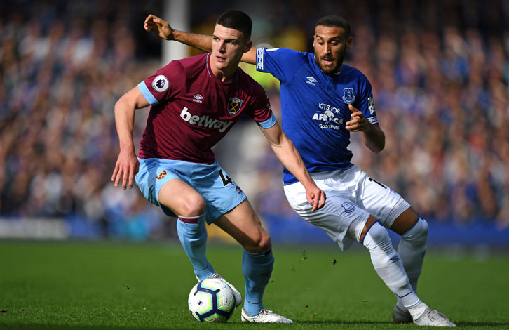 Declan Rice gets away from Everton striker Cenk Tosun