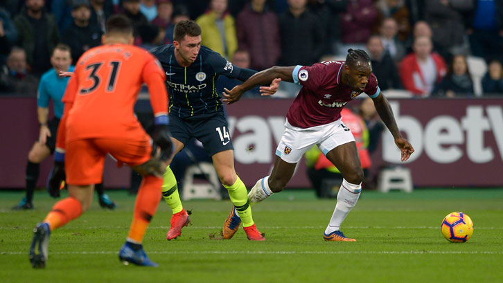 Michail Antonio in action against Manchester City