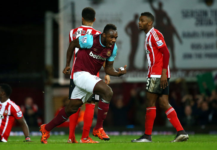 Michail Antonio celebrates scoring against Southampton in December 2015