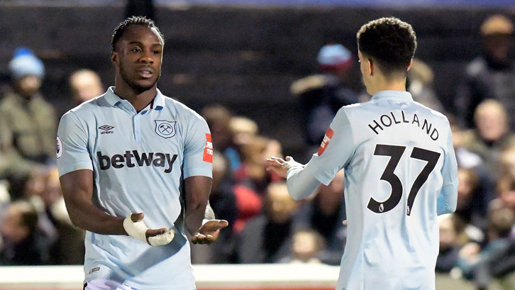 Michail Antonio and Nathan Holland celebrate