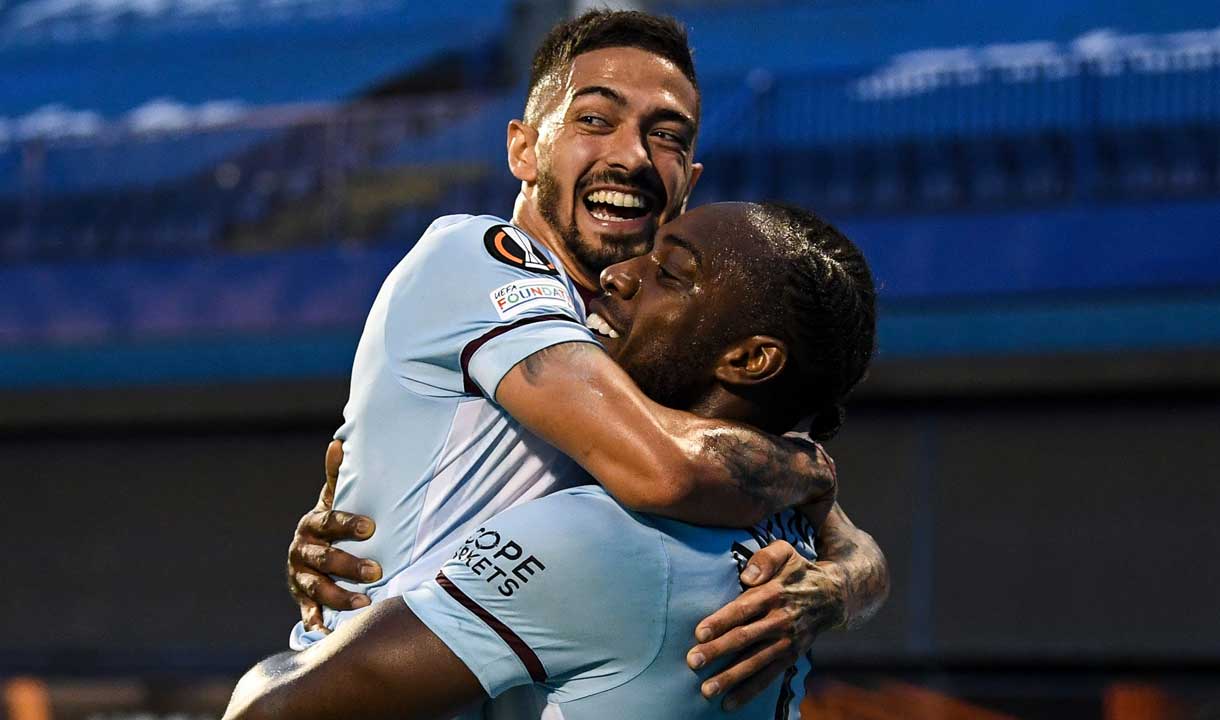 Michail Antonio celebrates with Manuel Lanzini