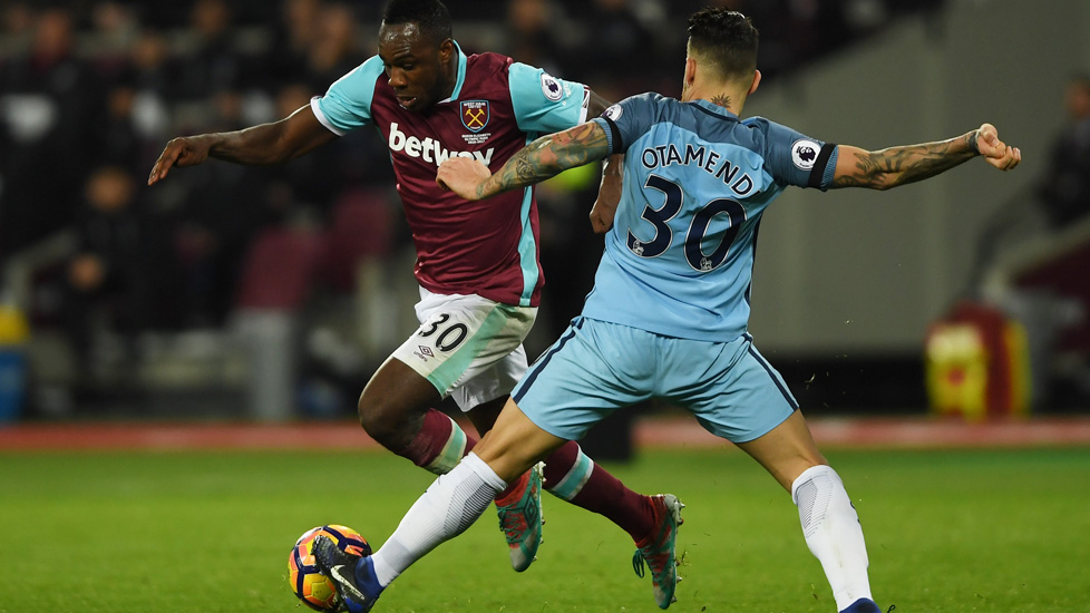 Michail Antonio takes on Nicolas Otamendi