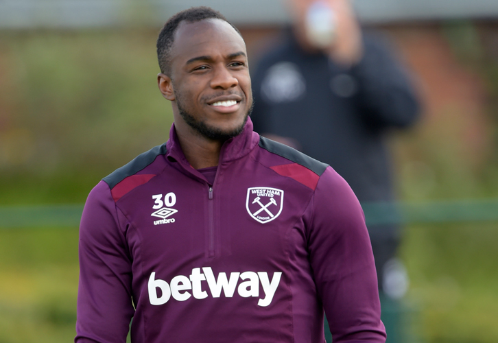 Michail Antonio cracks a smile in training