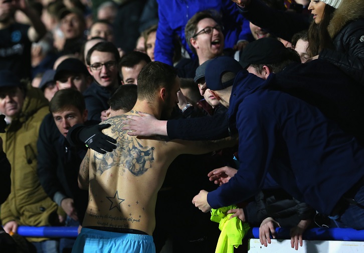 Marko Arnautovic salutes the fans at Huddersfield Town