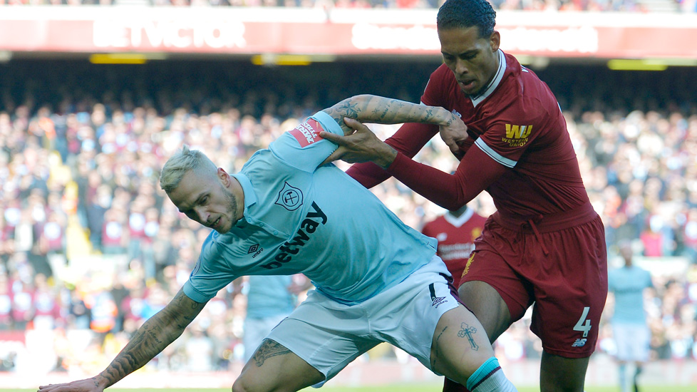 Marko Arnautovic holds off Roberto Firmino