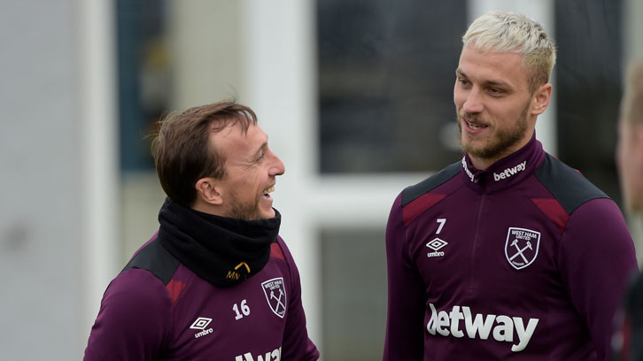 Mark Noble and Marko Arnautovic share a joke on the training pitch