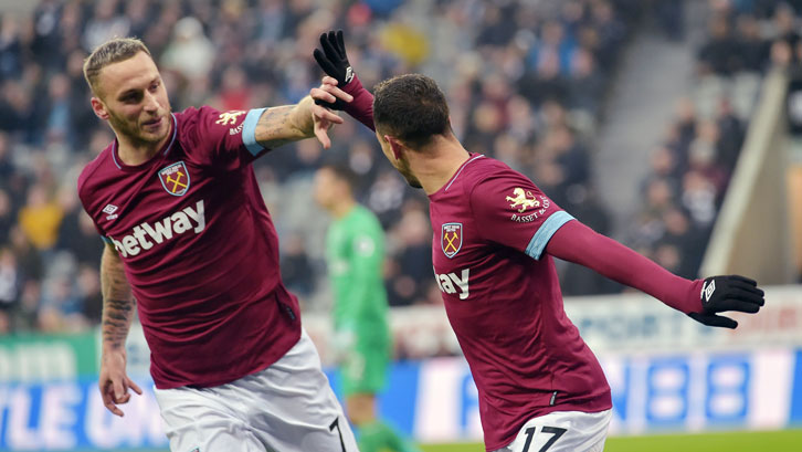 Marko Arnautovic and Chicharito celebrate the Mexican's goal at Newcastle United