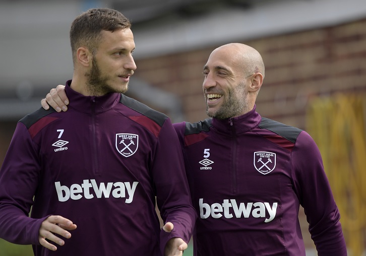 Marko Arnautovic and Pablo Zabaleta enjoy a laugh at Rush Green