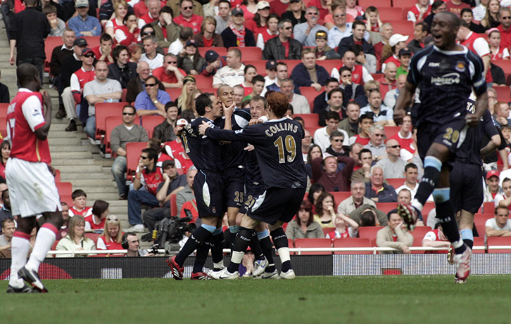 Bobby Zamora is mobbed after scoring West Ham United's winner at the Emirates in spring 2007