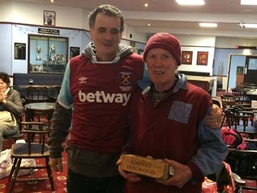 Johnny Hogwood, who has been a supporter for more than 60 years, collects his brick with son Richard