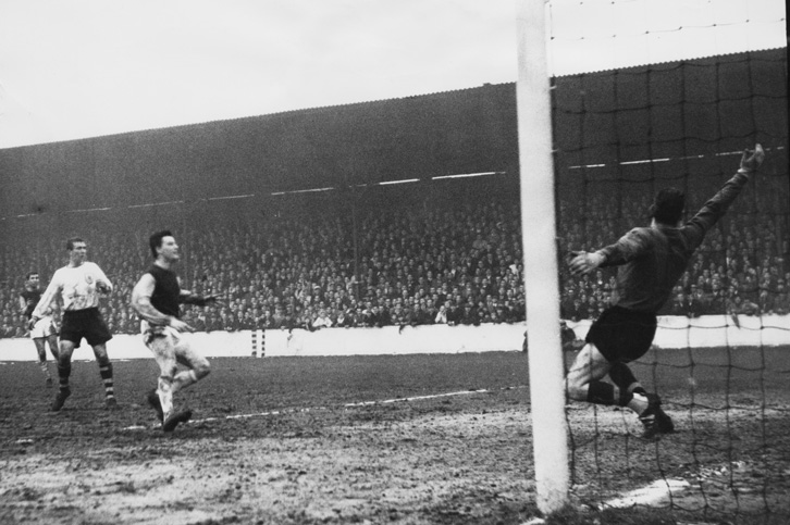 Johnny Byrne scores in the FA Cup quarter-final against Burnley