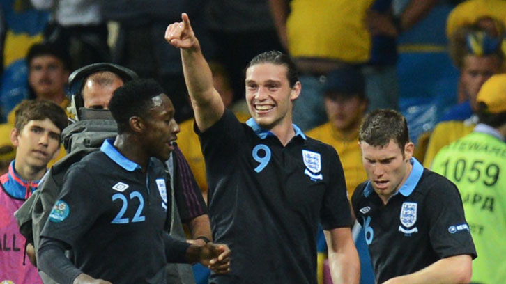 Andy Carroll celebrates scoring against Sweden
