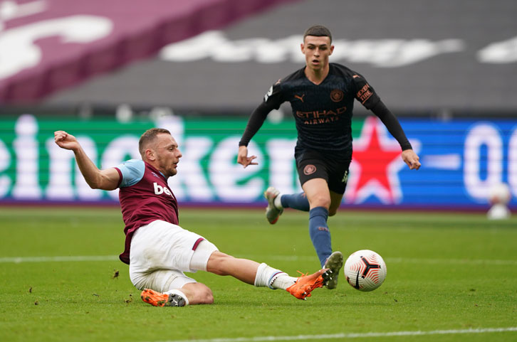 Vladimir Coufal challenges Phil Foden