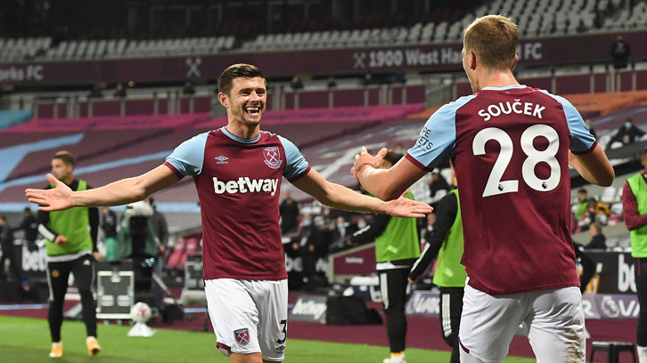 Aaron Cresswell with Tomas Soucek