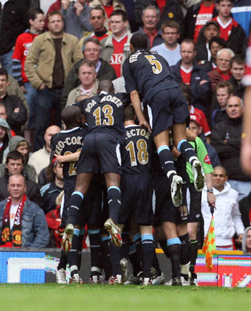 The Hammers celebrate Carlos Tevez's goal