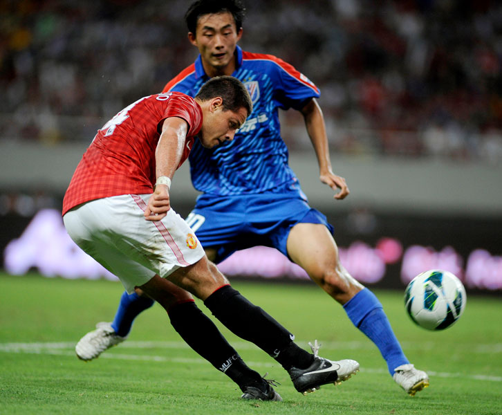 Chicharito in action for Manchester United against Shanghai Shenhua in July 2012