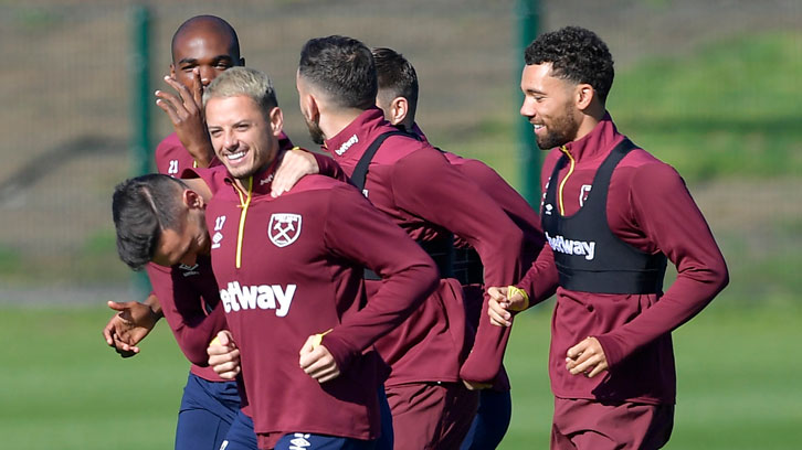 Chicharito smiles in training at Rush Green