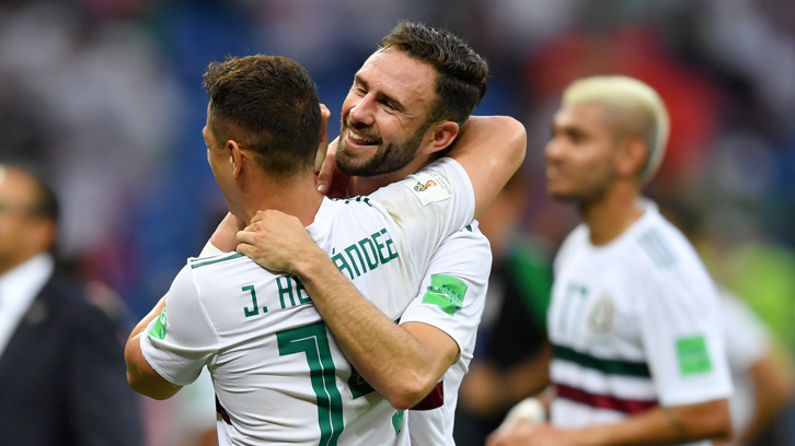 Chicharito is congratulated by Mexico teammate and friend Miguel Layun after scoring against South Korea