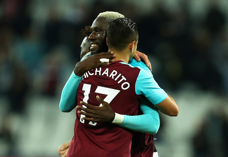 Chicharito congratulates Arthur Masuaku on his goal against Bolton