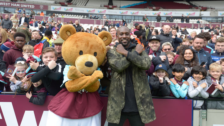 Bubbles the Bear and Carlton Cole meet youngsters at the Family Fun Day