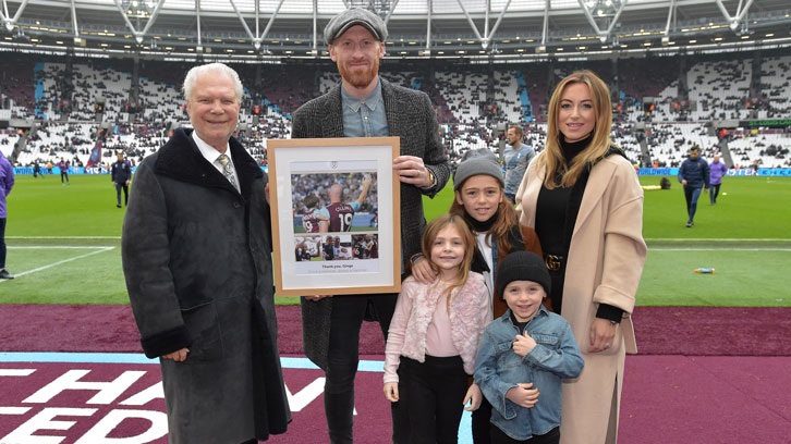 James Collins was joined pitchside by his wife and their three children