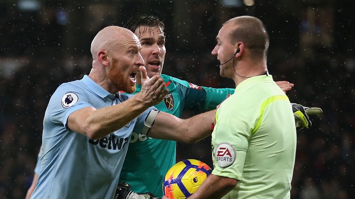 Captain James Collins remonstrates with referee Bobby Madley