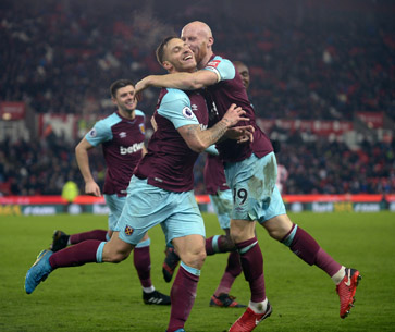 Collins congratulates Arnautovic after his goal