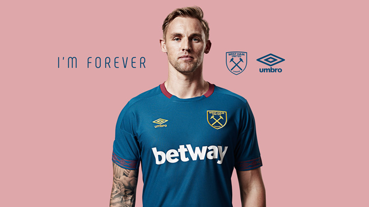 Jack Collison models the 2018/19 Away kit