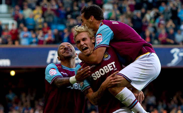 Jack Collison celebrates his goal against Blackpool