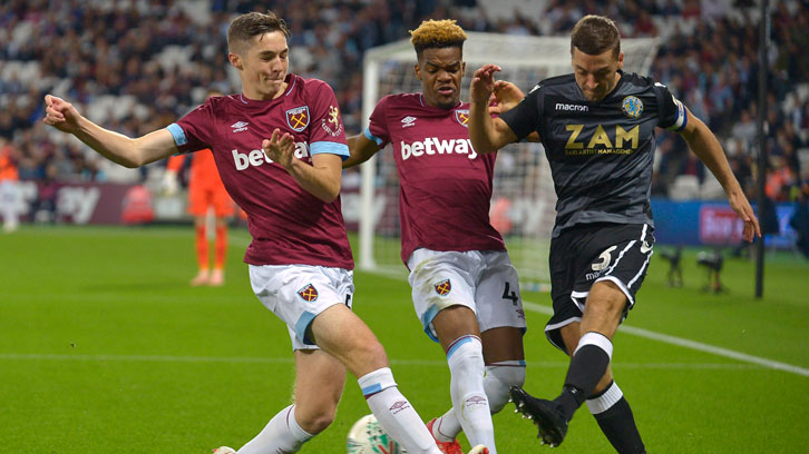 Conor Coventry and Grady Diangana in action on debut against Macclesfield Town