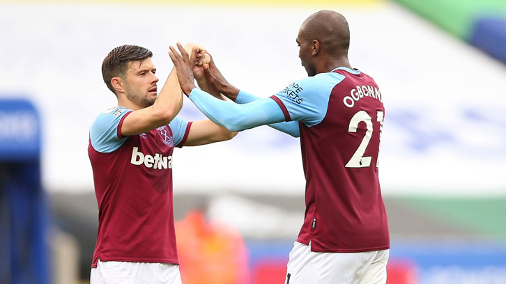 Aaron Cresswell celebrates with Angelo Ogbonna