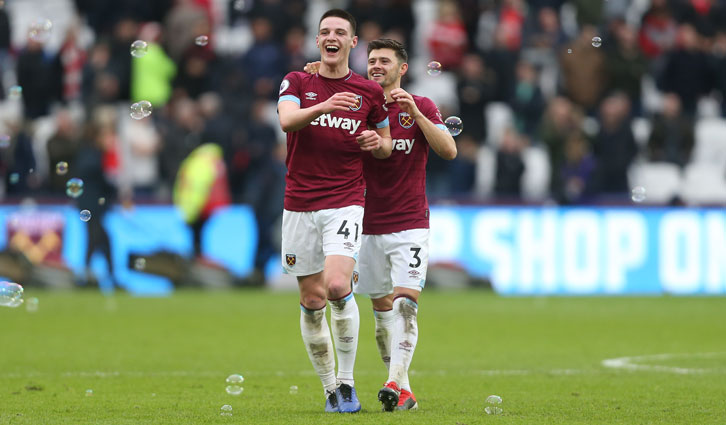 Aaron Cresswell with Declan Rice