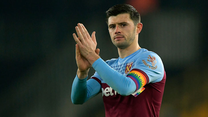 Aaron Cresswell applauds the fans