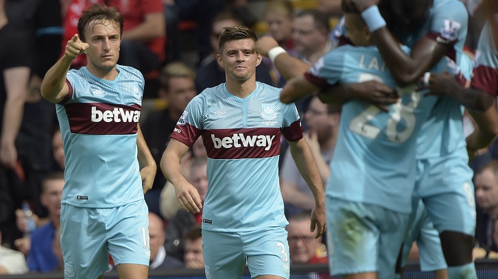 Aaron Cresswell celebrates victory at Anfield in August 2015