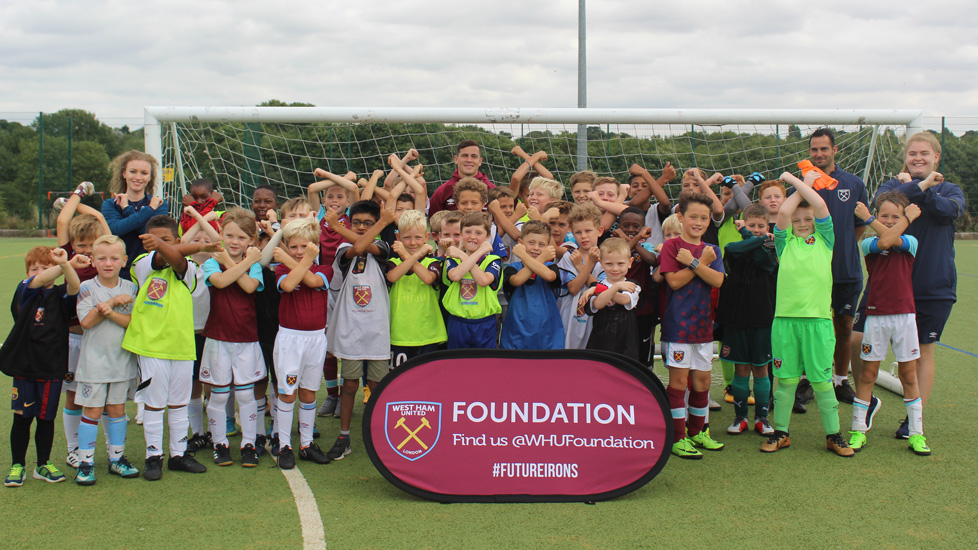 Josh Cullen with youngsters at a Foundation Soccer School